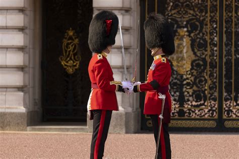 royal guards in front of palace.